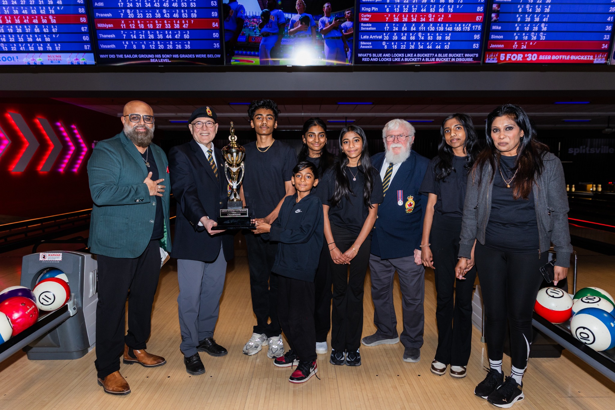 Trophy presentation moment at VIP Charity Bowling for the Brave
